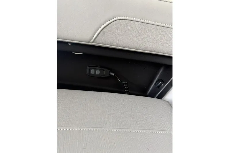 Slide: The Image of Interior detail of 2027 Monterey Elite 27 SD boat, featuring a control panel. - 12