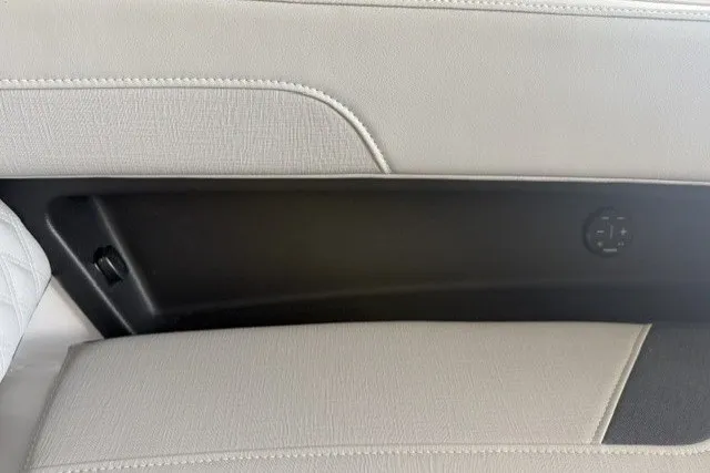 Slide: The Image of Interior detail of 2027 Monterey Elite 27 SD, featuring sleek, modern design and stitching. - 11