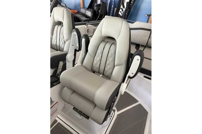 Slide: The Image of Luxurious seating on the 2027 Monterey Elite 27 SD boat, featuring plush, ergonomic design. - 6