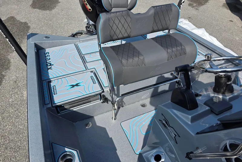 Slide: The Image of 2027 Xpress H20B Bay boat interior with stylish seating and modern console design. - 14