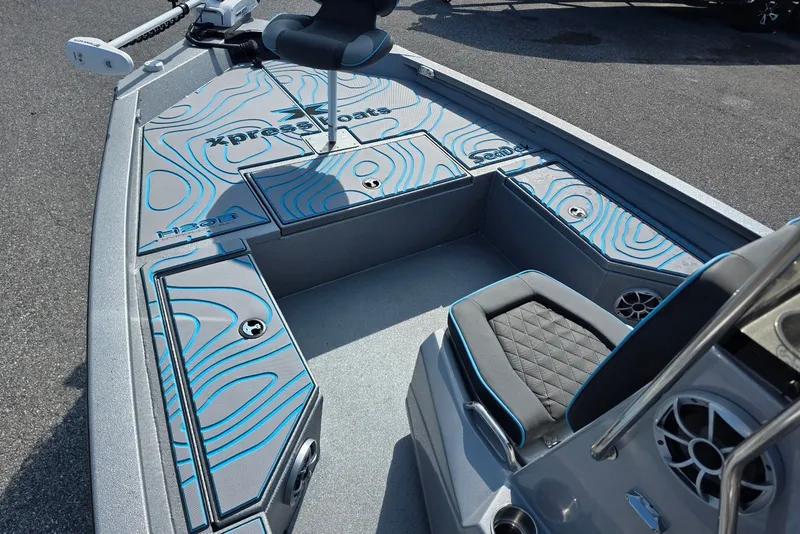 Slide: The Image of 2027 Xpress H20B Bay boat interior with custom SeaDek flooring and seating. - 8