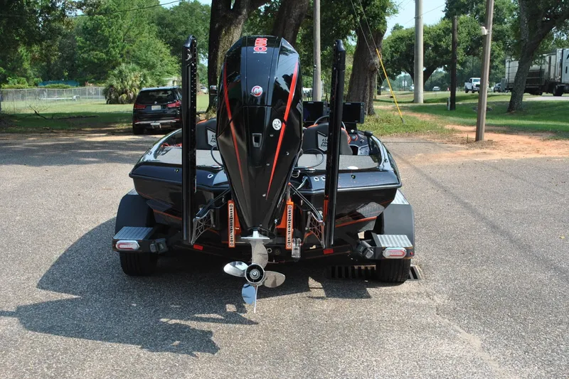 Slide: The Image of 2021 Blazer 650 Pro Tour boat on trailer, parked outdoors. - 6