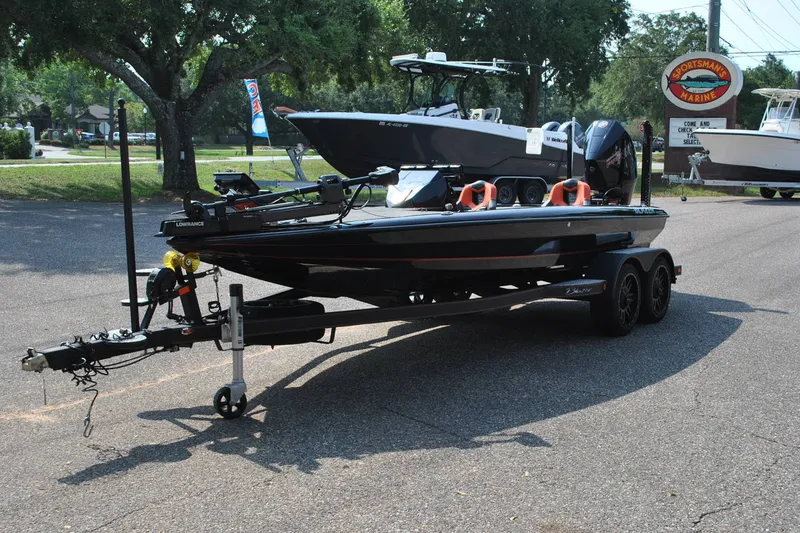 Slide: The Image of 2021 Blazer 650 Pro Tour boat on trailer at Sportsman's Marine dealership. - 2