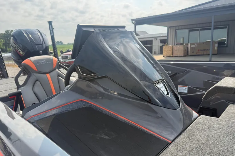 Slide: The Image of 2027 Skeeter ZXE20 boat console with sleek design and modern seating. - 16