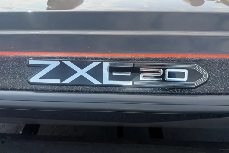 Slide: The Image of 2027 Skeeter ZXE20 logo on a sleek, dark surface with red accents. - 17