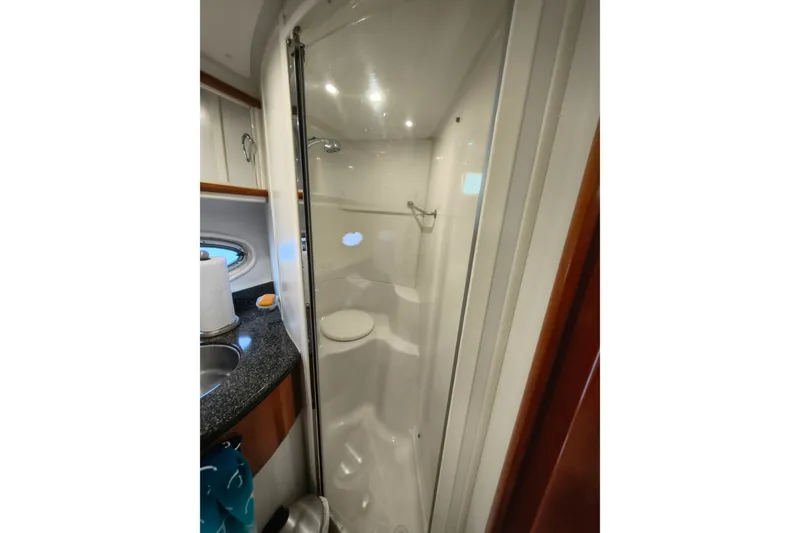 Slide: The Image of Shower area in 2006 Carver 444 Cockpit Motor Yacht, featuring sleek design and modern amenities. - 34