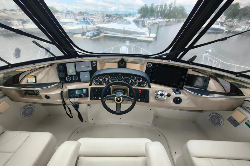 Slide: The Image of Cockpit view of 2006 Carver 444 Cockpit Motor Yacht with modern navigation instruments. - 17