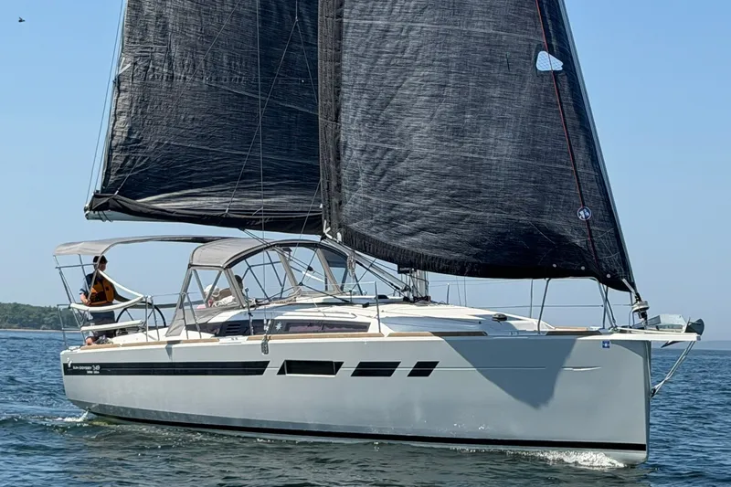 Slide: The Image of 2022 Jeanneau Sun Odyssey 349 Performance sailboat cruising on open water. - 36