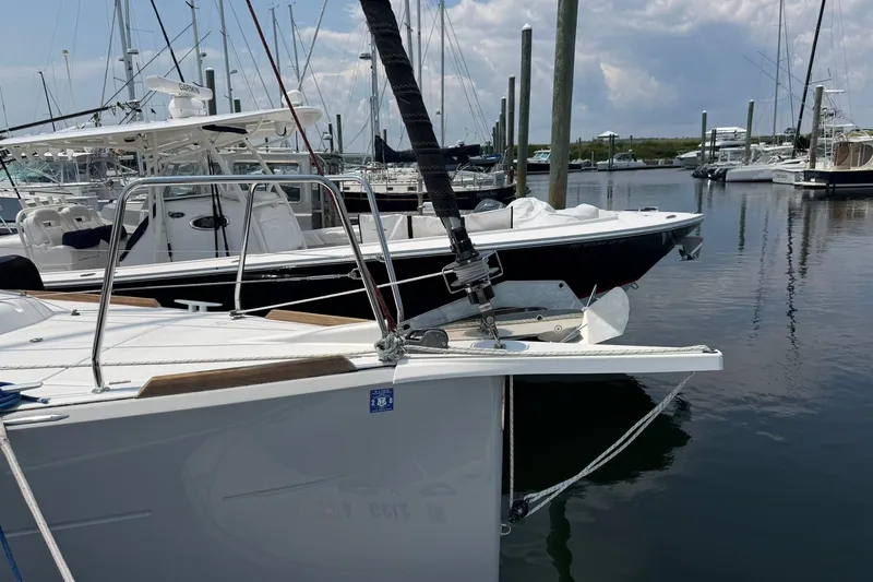 Slide: The Image of Jeanneau Sun Odyssey 349 Performance 2022 sailboat docked in a marina. - 21