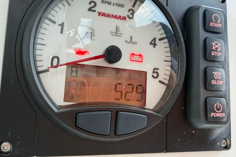Slide: The Image of Close-up of Jeanneau Sun Odyssey 349 Performance 2022 engine control panel displaying RPM and indicators. - 41