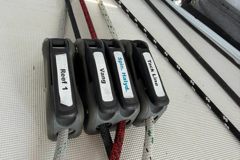 Slide: The Image of Close-up of sailing rope clutches on a 2022 Jeanneau Sun Odyssey 349 Performance yacht. - 5