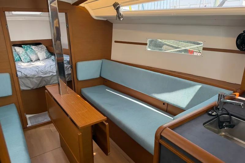 Slide: The Image of Interior of 2022 Jeanneau Sun Odyssey 349 Performance yacht with cozy seating and modern design. - 42