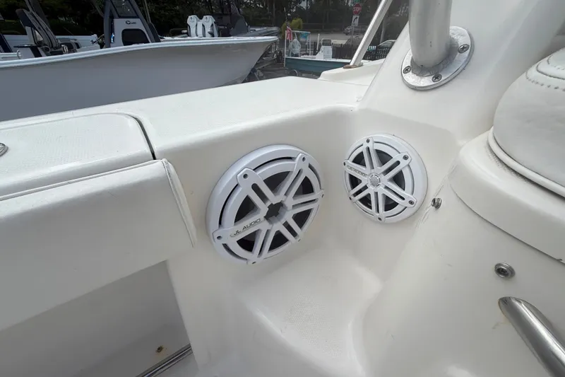 Slide: The Image of 2011 Robalo R305 Walkaround boat with JL Audio speakers installed. - 22