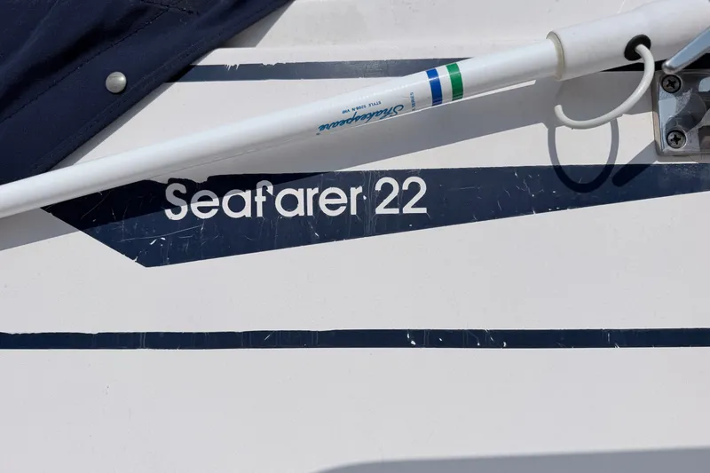 Slide: The Image of 1993 Grady-White Seafarer 22 boat detail with logo and equipment. - 3