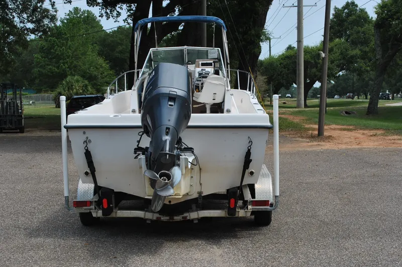 Slide: The Image of 1988 Grady-White Overnighter 20 boat on trailer, rear view with outboard motor. - 5