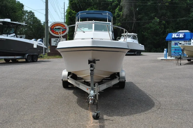 Slide: The Image of 1988 Grady-White Overnighter 20 boat on trailer at dealership lot. - 3