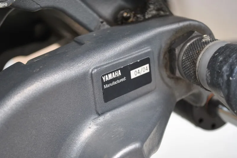 Slide: The Image of Close-up of Yamaha engine part on 1988 Grady-White Overnighter 20 boat. - 9
