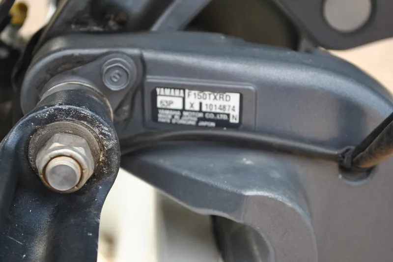 Slide: The Image of Close-up of Yamaha F150TXRD engine part on 1988 Grady-White Overnighter 20 boat. - 10