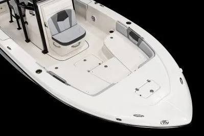 Slide: The Image of 2027 Robalo 226 Cayman boat, sleek white design, spacious seating, and modern features. - 7