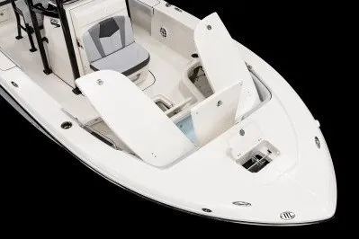Slide: The Image of 2027 Robalo 226 Cayman boat with open storage compartments, sleek white design. - 9