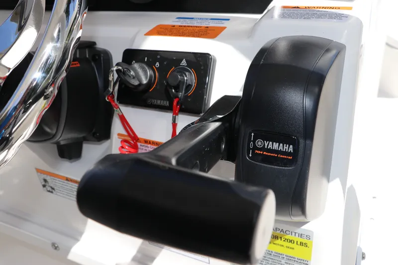 Slide: The Image of Close-up of Yamaha controls on a 2027 Robalo 226 Cayman boat. - 13