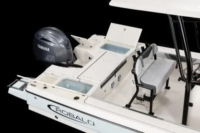Slide: The Image of 2027 Robalo 226 Cayman boat with Yamaha engine, featuring seating and storage compartments. - 3