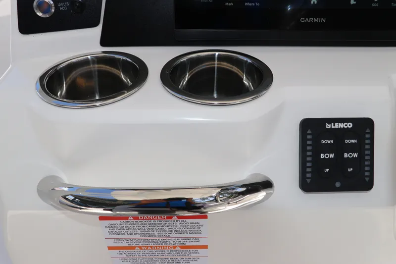 Slide: The Image of 2027 Robalo 226 Cayman boat console with cup holders and Lenco controls. - 15