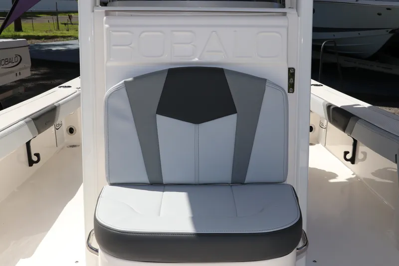 Slide: The Image of 2027 Robalo 226 Cayman boat seat with stylish gray and white upholstery. - 20