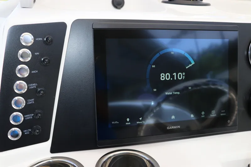 Slide: The Image of Dashboard of 2027 Robalo 226 Cayman boat with Garmin display showing water temperature. - 16