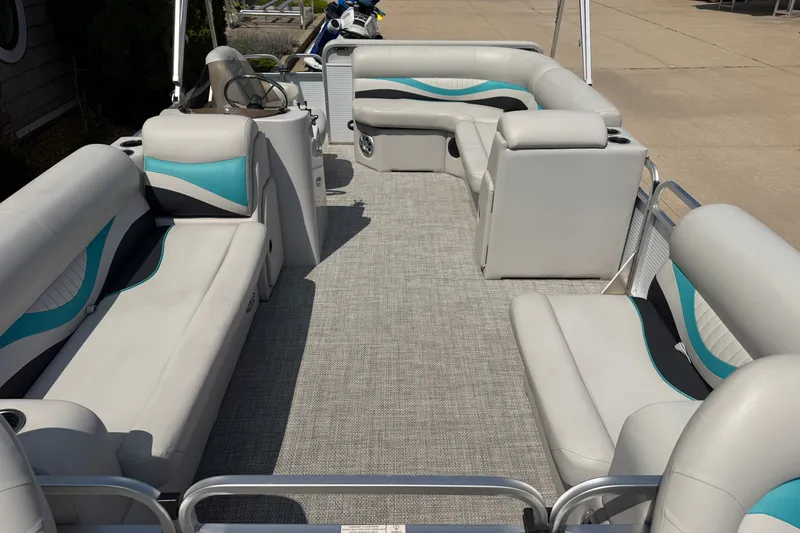 Slide: The Image of Spacious interior of 2020 Quest Edge 820 pontoon boat with stylish seating. - 3