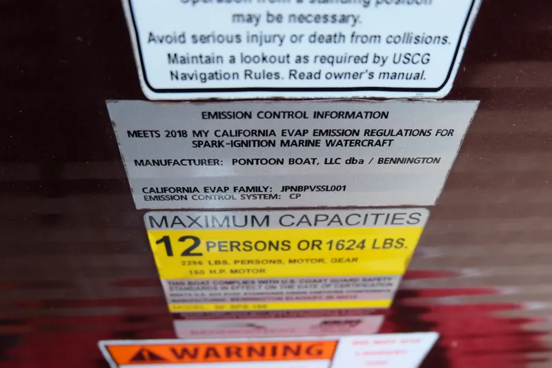 Slide: The Image of 2018 Bennington 21 SLXP emission and capacity label, compliant with California regulations. - 12