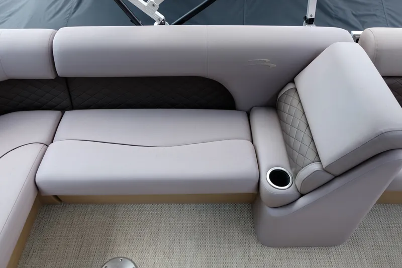 Slide: The Image of Luxurious seating on a 2018 Bennington 21 SLXP pontoon boat with quilted upholstery and cup holder. - 14