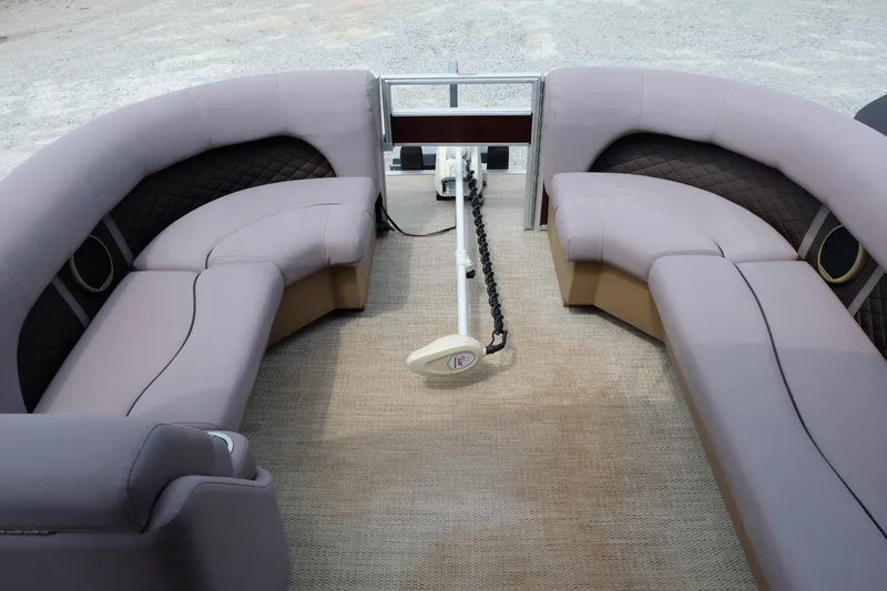 Slide: The Image of Luxurious seating on a 2018 Bennington 21 SLXP pontoon boat, featuring plush upholstery. - 4