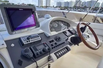 Slide: The Image of Cockpit of 1998 Viking Princess 56 Sport Cruiser with navigation equipment and steering wheel. - 11