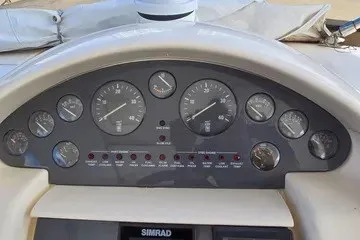 Slide: The Image of Dashboard of 1998 Viking Princess 56 Sport Cruiser with gauges and controls. - 14