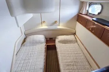 Slide: The Image of Twin cabin interior of 1998 Viking Princess 56 Sport Cruiser yacht. - 32
