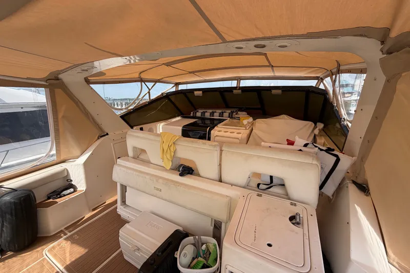 Slide: The Image of Interior view of a 2001 Tiara 35 Express yacht with seating and storage. - 22