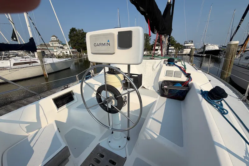 Slide: The Image of Cockpit of a 1989 Hunter 30 sailboat with Garmin navigation system at marina. - 5