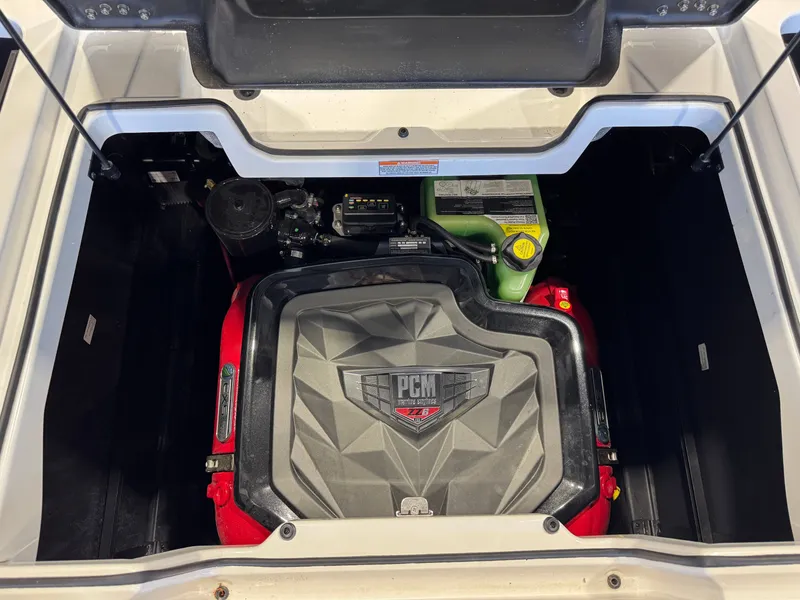 Slide: The Image of The engine compartment of a 2024 Nautique Super Air Nautique G23 with a PCM engine. - 29