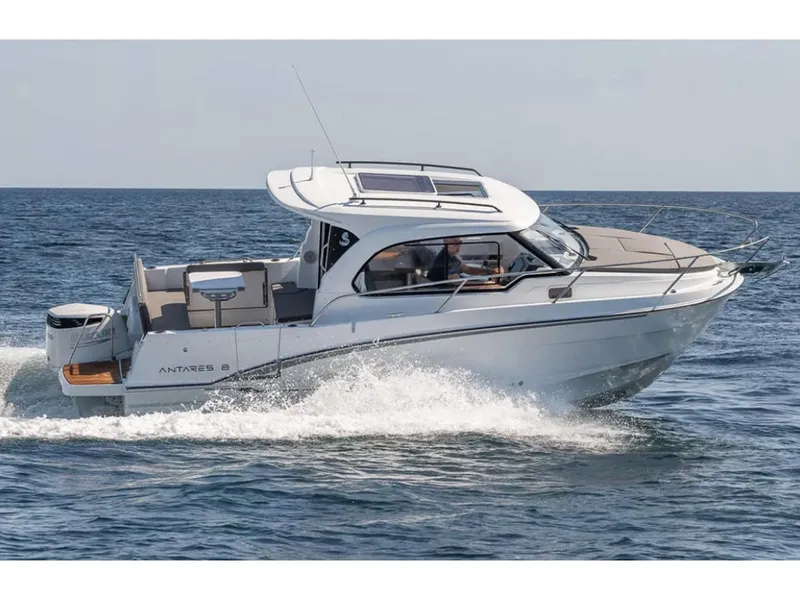 Slide: The Image of Manufacturer Provided Image: 2025 Beneteau Antares 8 cruising on open water, showcasing sleek design and modern features. - 1
