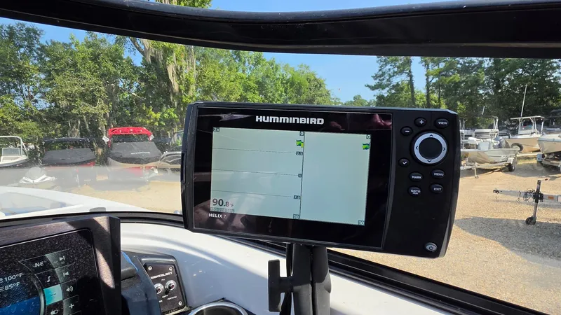 Slide: The Image of A Humminbird fish finder is mounted on a Scarab 255 ID Wake Edition boat. - 11