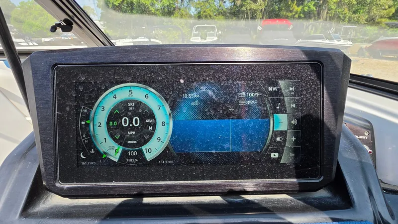 Slide: The Image of The image shows a dashboard with a digital speedometer and other gauges. - 10