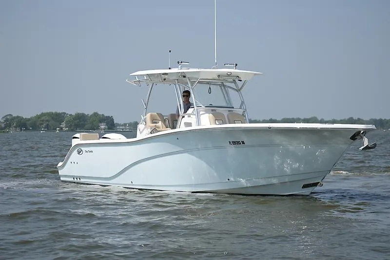 Slide: The Image of 2018 Sea Fox 328 Commander on calm water with protective hardtop. - 5