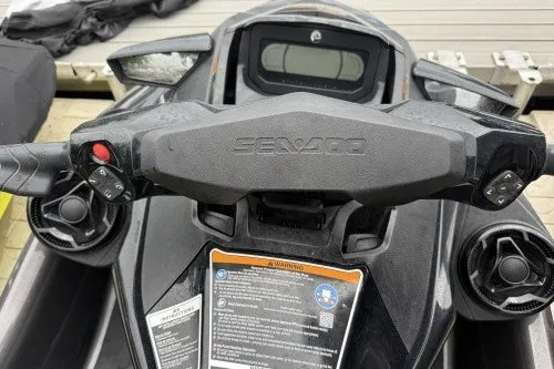 Slide: The Image of 2021 Sea-Doo GTX handlebars and dashboard, featuring control buttons and display. - 7