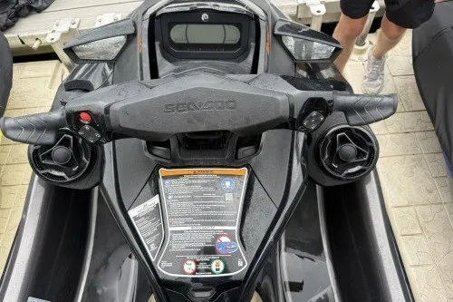 Slide: The Image of 2021 Sea-Doo GTX handlebars and dashboard, showcasing controls and design details. - 5