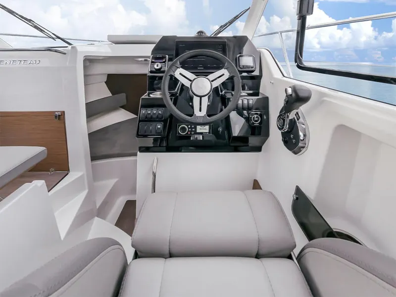 Slide: The Image of Manufacturer Provided Image: 2026 Beneteau Antares 8 Fishing boat interior with modern steering console and seating. - 3