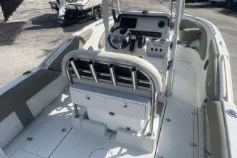 Slide: The Image of 2023 Crownline 220 CC Finseeker boat interior with modern helm and seating. - 8