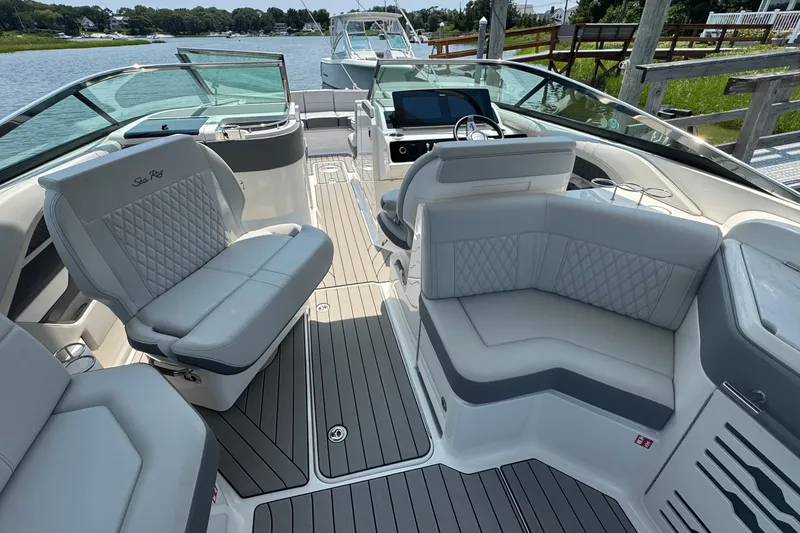 Slide: The Image of Luxurious interior of 2025 Sea Ray SLX 310 Outboard boat with plush seating and modern design. - 32