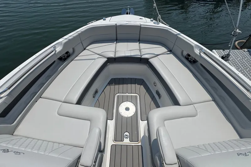 Slide: The Image of 2025 Sea Ray SLX 310 Outboard boat interior with luxurious seating and sleek design. - 45
