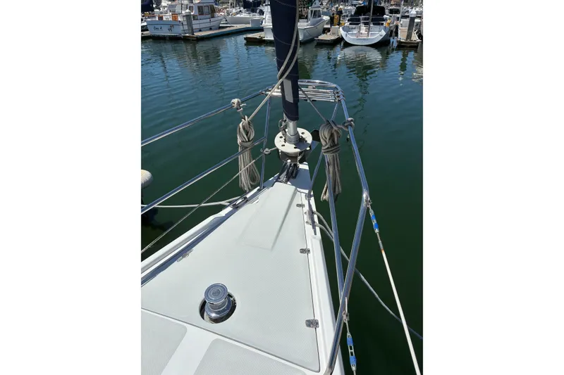 Slide: The Image of Bow of 2001 Catalina 42 MkII sailboat docked in marina. - 13